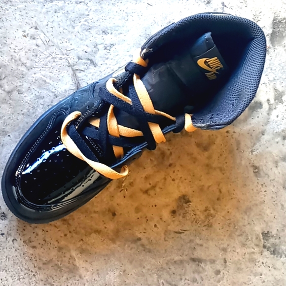 Dressed in a Black and Metallic Gold color scheme. main image 4